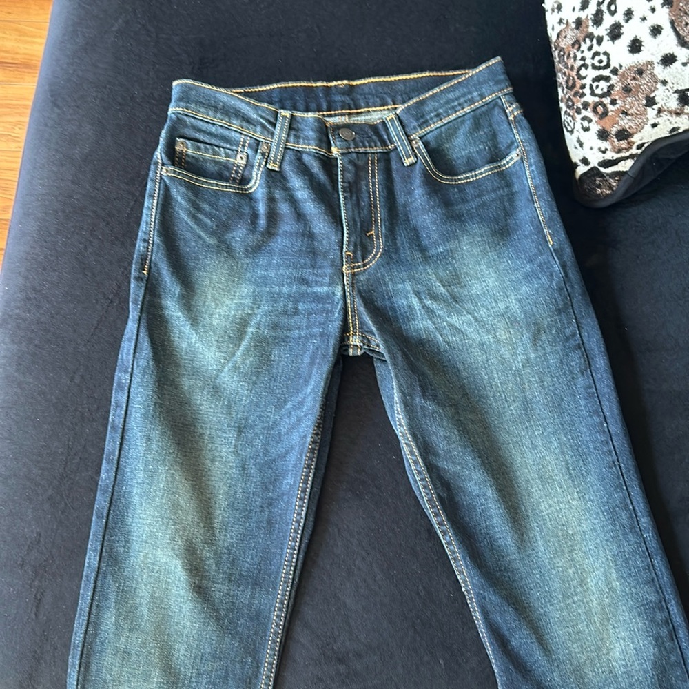 Young Men’s Levi Strauss & Co 511 dark blue denim jeans.